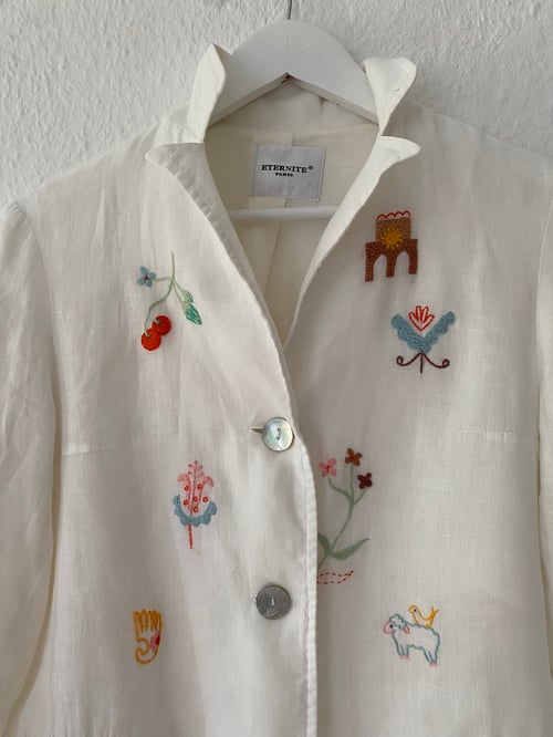 Image of Upcycled white linen blazer with hand embroidered slavic ornaments inspired motives