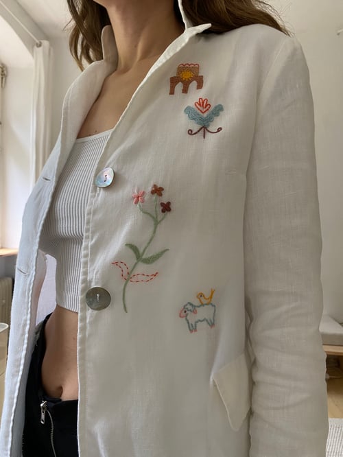 Image of Upcycled white linen blazer with hand embroidered slavic ornaments inspired motives