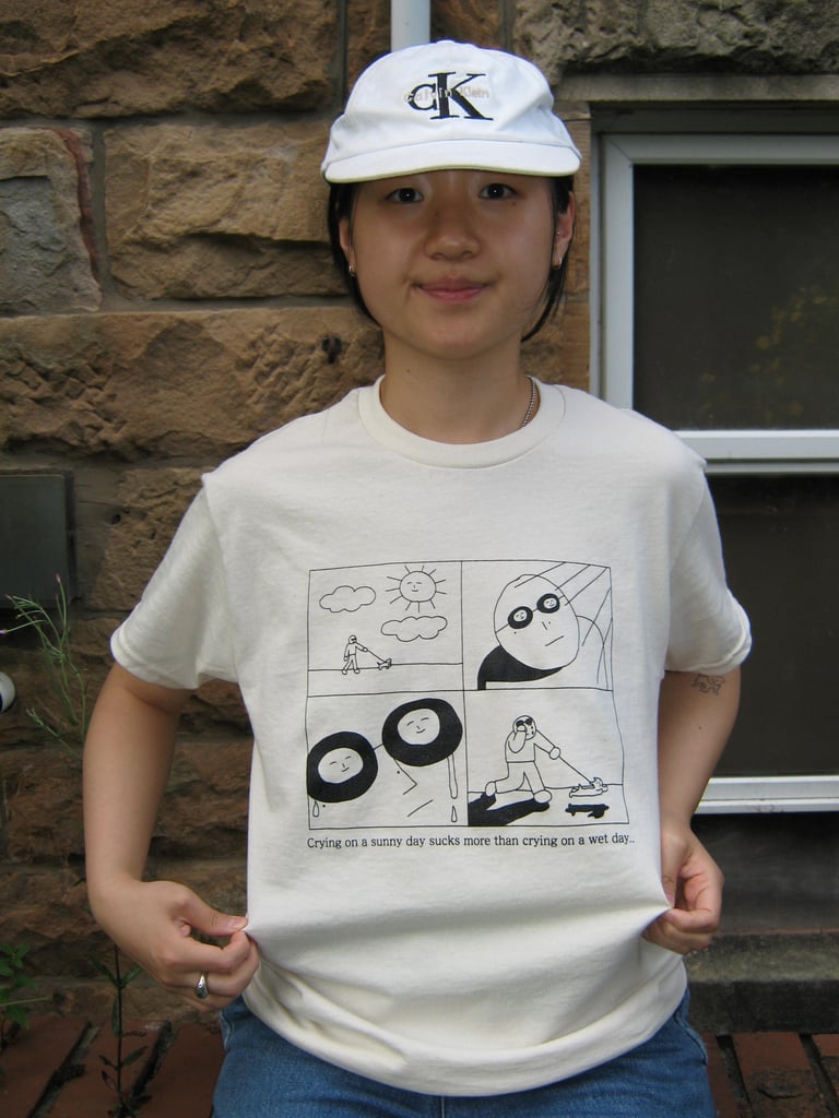 Crying on a sunny day sucks more than crying on a wet day. T-shirt Image 3