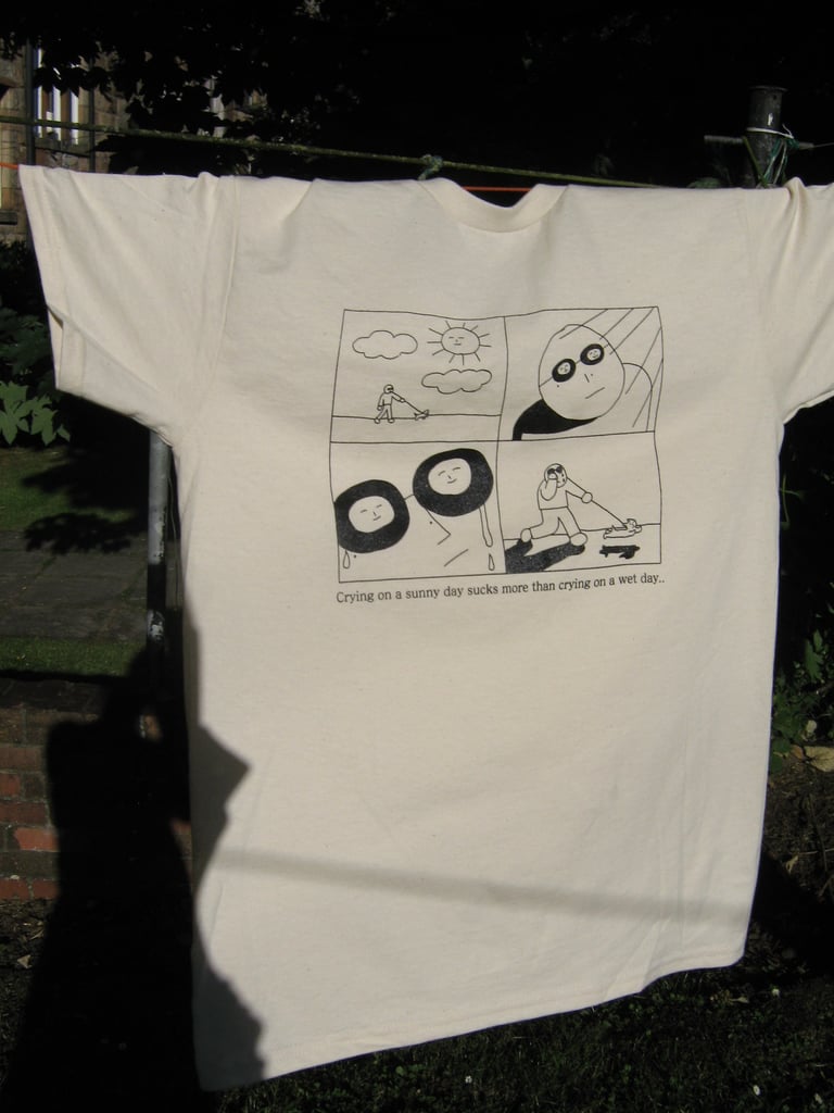Crying on a sunny day sucks more than crying on a wet day. T-shirt Image 2