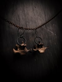 Image 1 of vertebra dangles