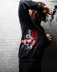 Image 2 of 'lie to my face V.2' hoodie.