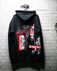 Image 3 of 'lie to my face V.2' hoodie.