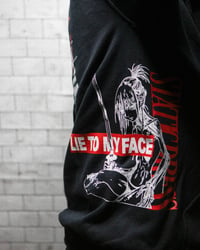 Image 4 of 'lie to my face V.2' hoodie.