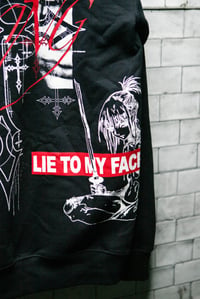 Image 5 of 'lie to my face V.2' hoodie.