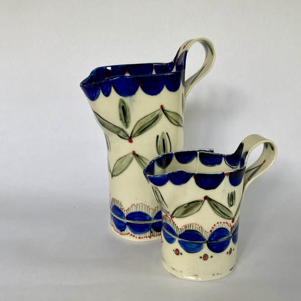 Image of Blue scalloped pattern jugs