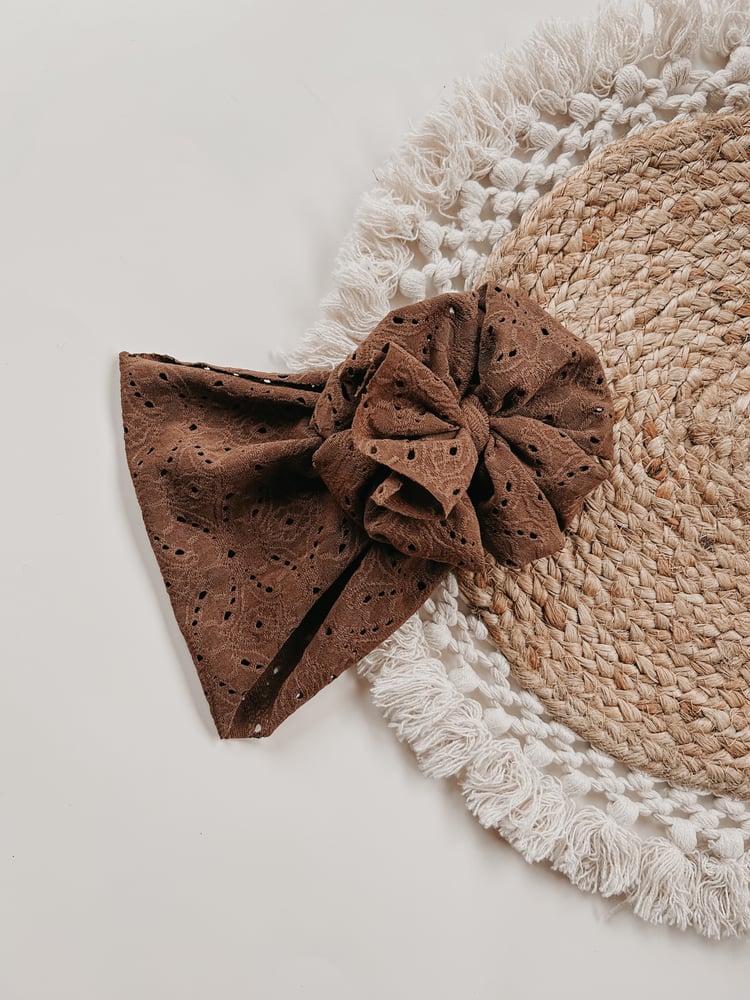 Image of BROWN EYELET