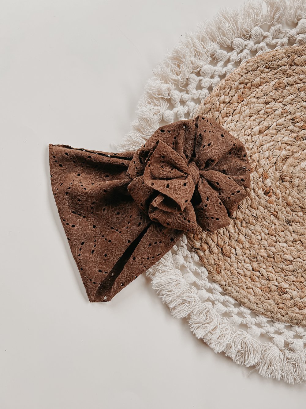 Image of BROWN EYELET