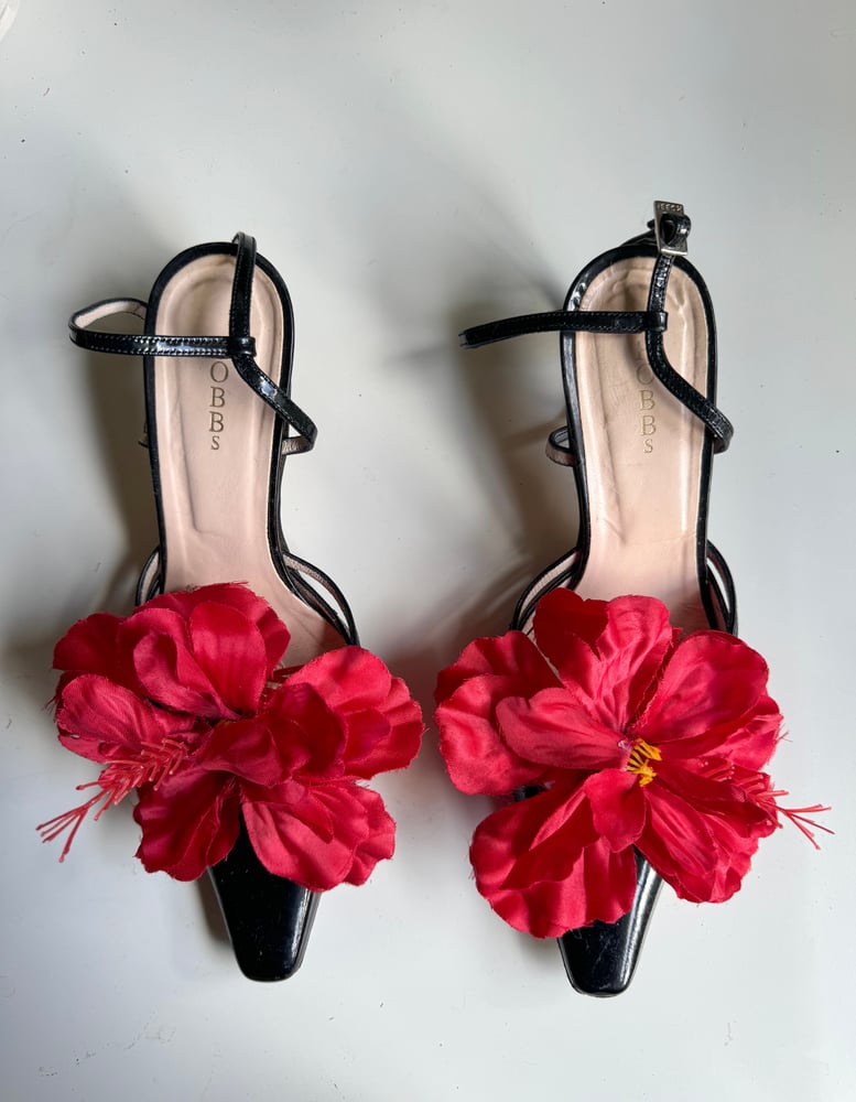 Image of red hibiscus shoe clips