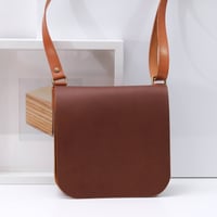 Image 1 of Tiny Travel Sling in brown