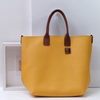 Image 1 of Slouchy Wide Tote in pebbled sunflower yellow