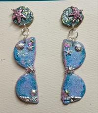Image 1 of Sunglasses  earrings to wear for that bright sunny day