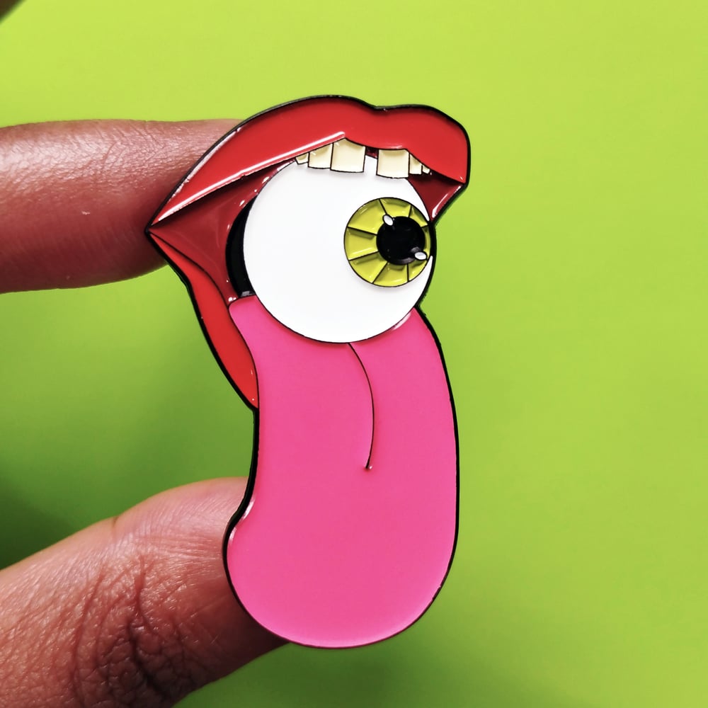 Image of oddball enamel pin