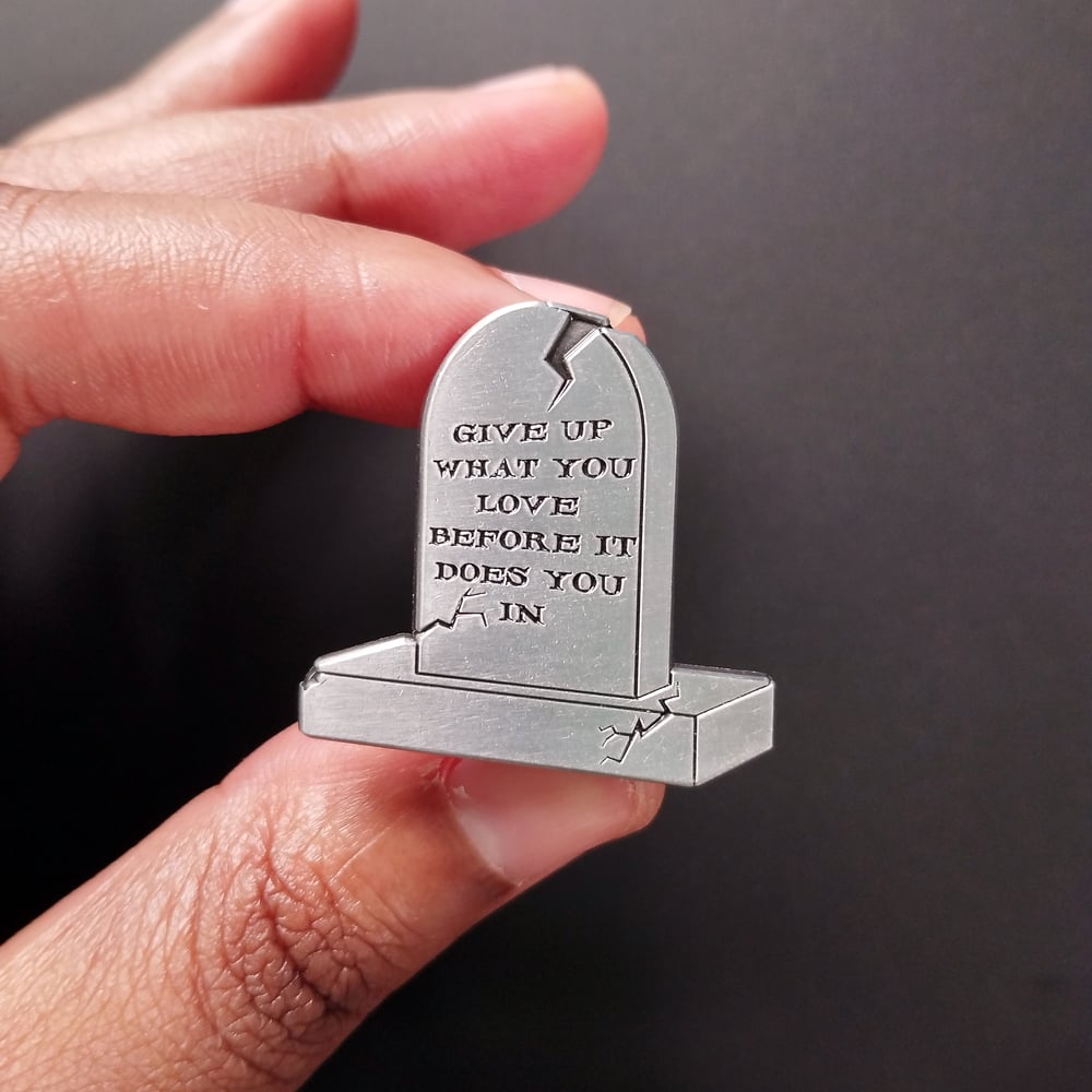 Image of give up what you love enamel pin