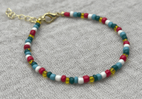 Image 1 of Glass Seed Bead Bracelet (yellow, red, blue, and green)