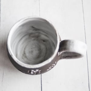 Image of Small Pottery Mug with Dark Brown Raw Stone Clay, Carved Flowers, Made in USA