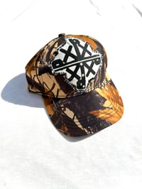 Image of a new way cap in forest camo 