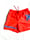 Image of beach day shorts in bright orange 