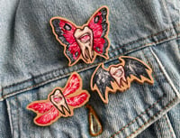 Image 2 of wooden pin. Tooth-moth