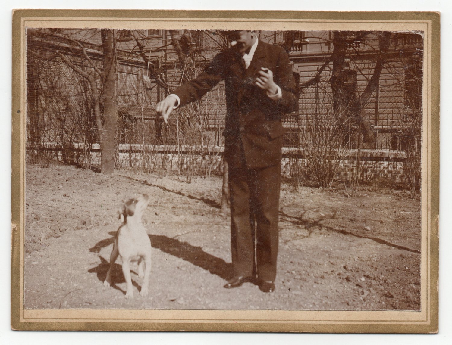 Image of Jean de Bourgoing: playing with his dog, Austria ca. 1894