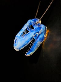 Image 3 of Moonstone T-Rex skull pendant.