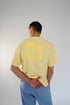 Play. (verb) Yellow Tee Image 2
