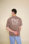 Play. (verb) Brown Tee