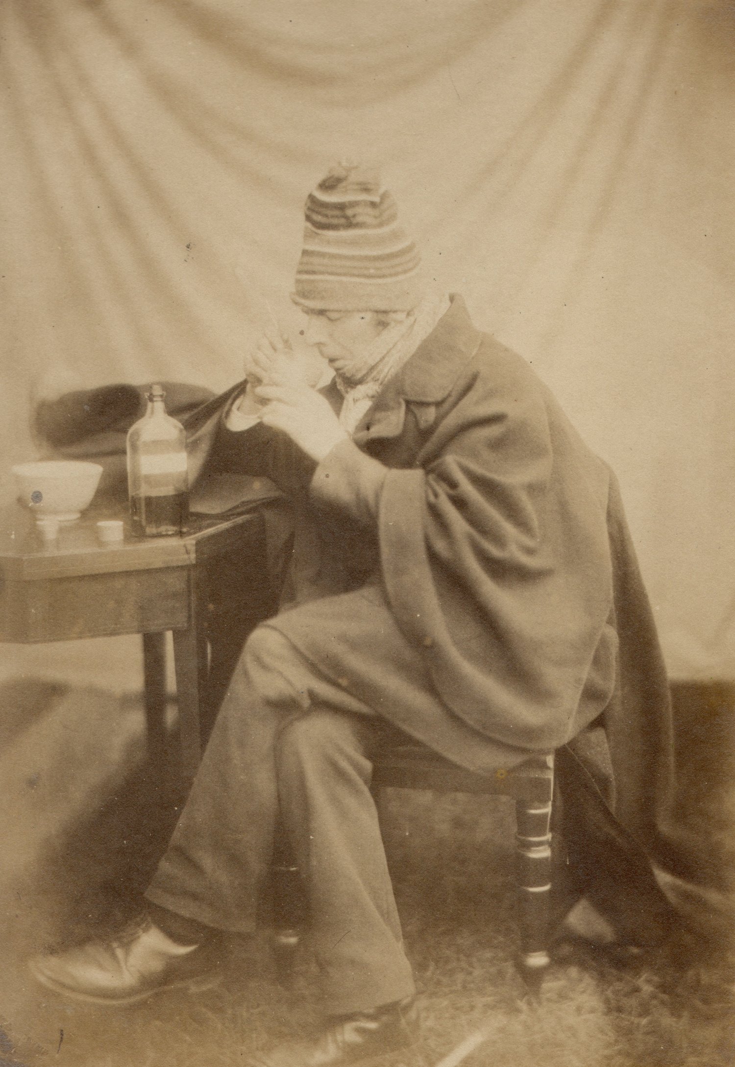 Image of Anonyme: sick man takes a medicine, ca. 1860