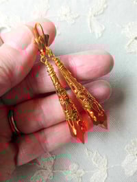 Image 2 of Vamp Ornate Pointed Earrings, Orange-Red & Antique Gold, Pierced or Clip On