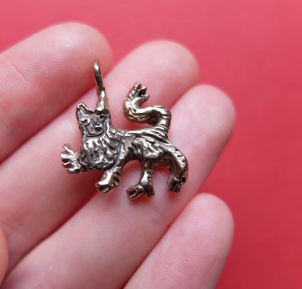 Medieval lion charm (silver/bronze)