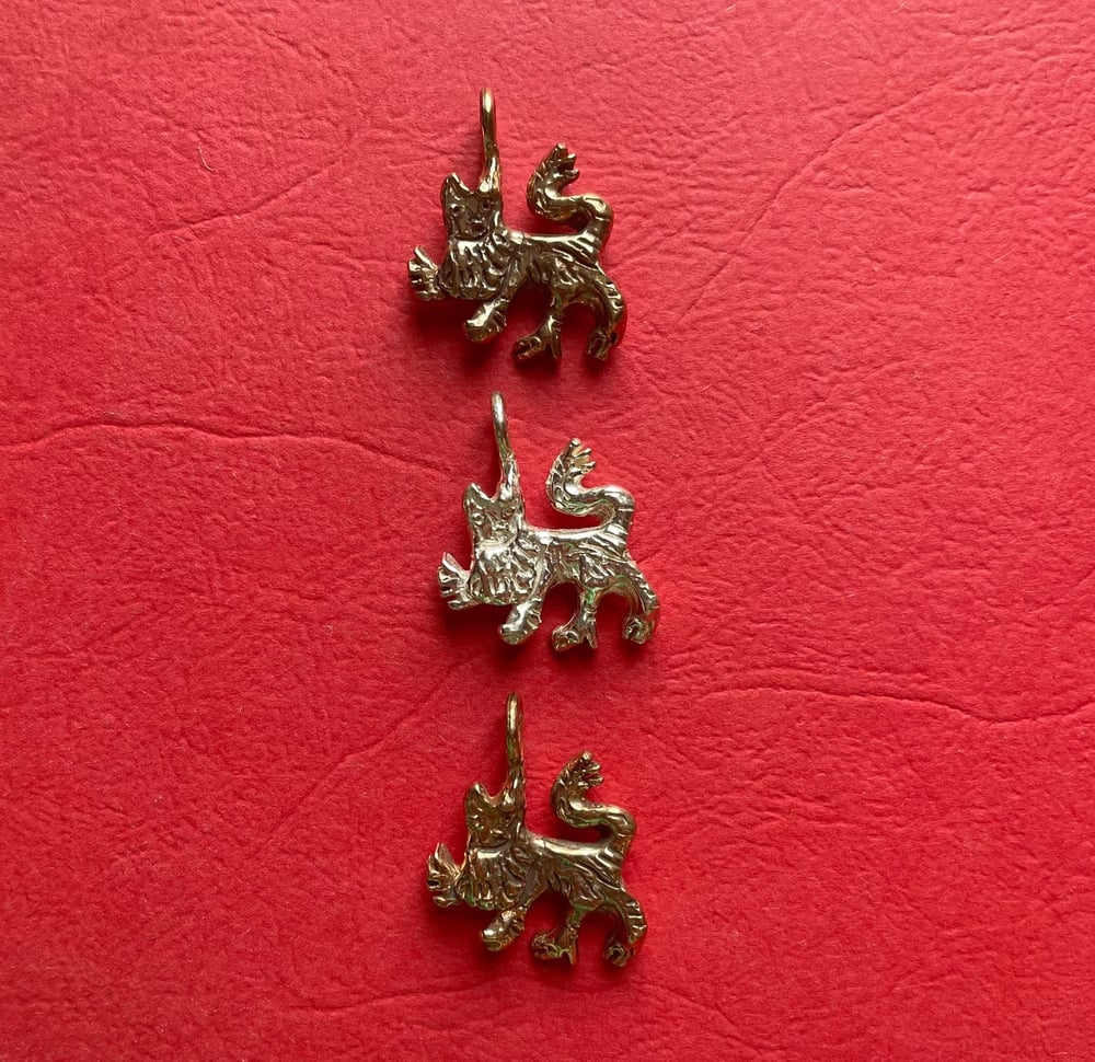 Medieval lion charm (silver/bronze)