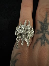 Image 1 of trident claw ring