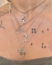 Image 2 of Stacked clovers charm 