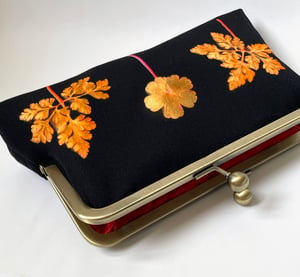 Image of Orange ferns, printed silk clutch bag with chain handle