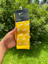 Image 1 of Yellow Nike Socks