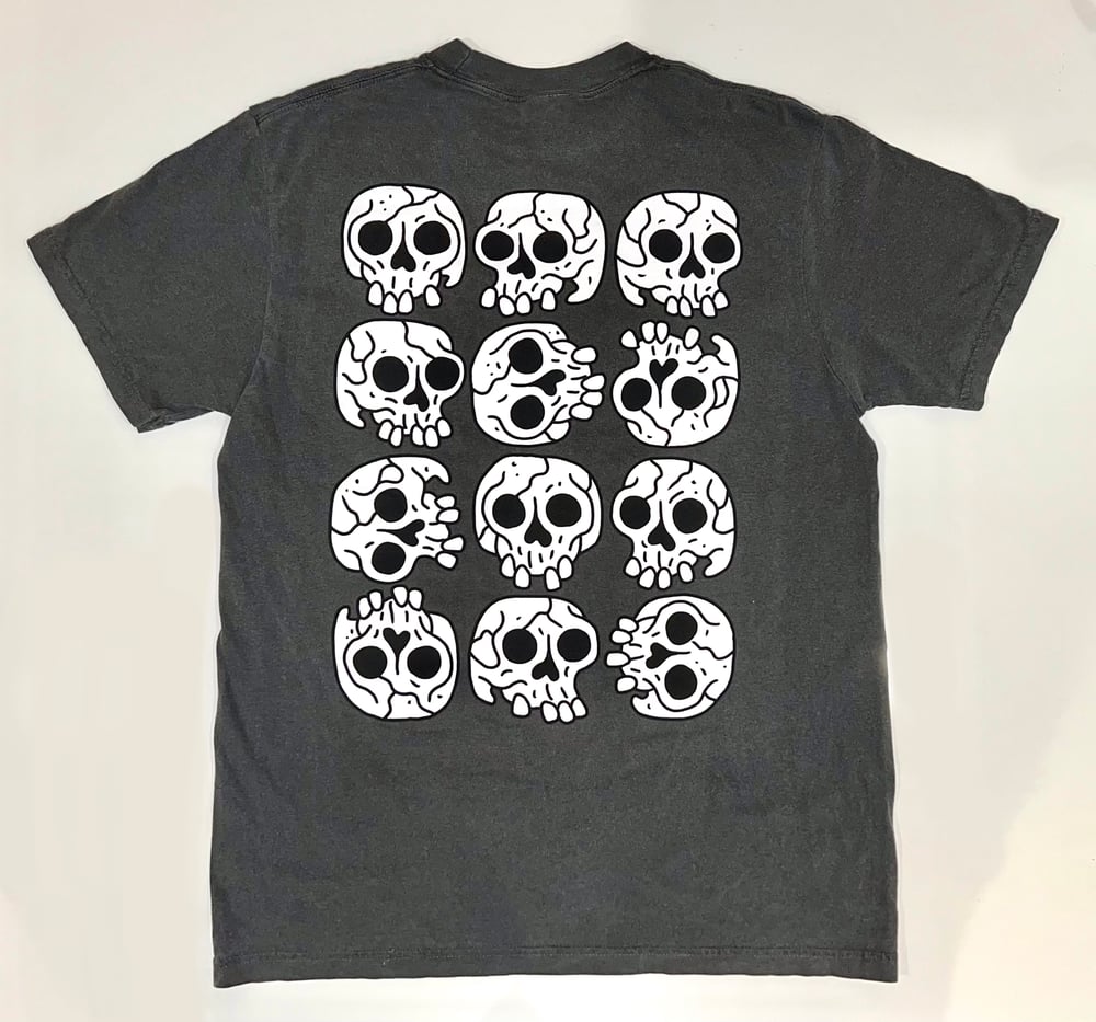 White skulls on vintage black t-shirt 