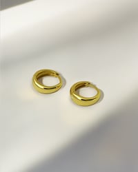 Image 2 of Huggie Hoops in Gold