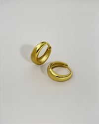 Image 1 of Huggie Hoops in Gold