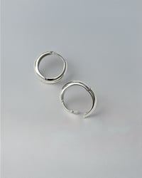 Image 4 of Huggie Hoops in Silver