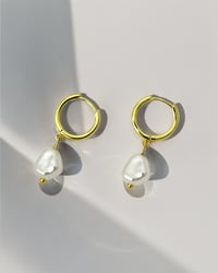 Image 3 of Pearl Drop Huggie Hoops in Gold