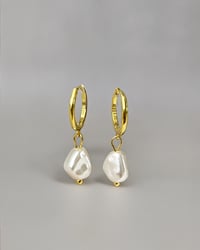 Image 5 of Pearl Drop Huggie Hoops in Gold
