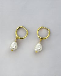 Image 1 of Pearl Drop Huggie Hoops in Gold