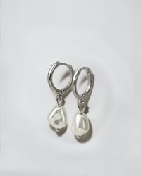 Image 1 of Pearl Drop Huggie Hoops in Silver