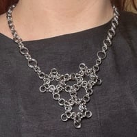 Image 3 of Disease Necklace 