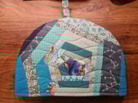 Image 2 of Vortex tea cosies