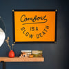 COMFORT IS A SLOW DEATH CAMP FLAG