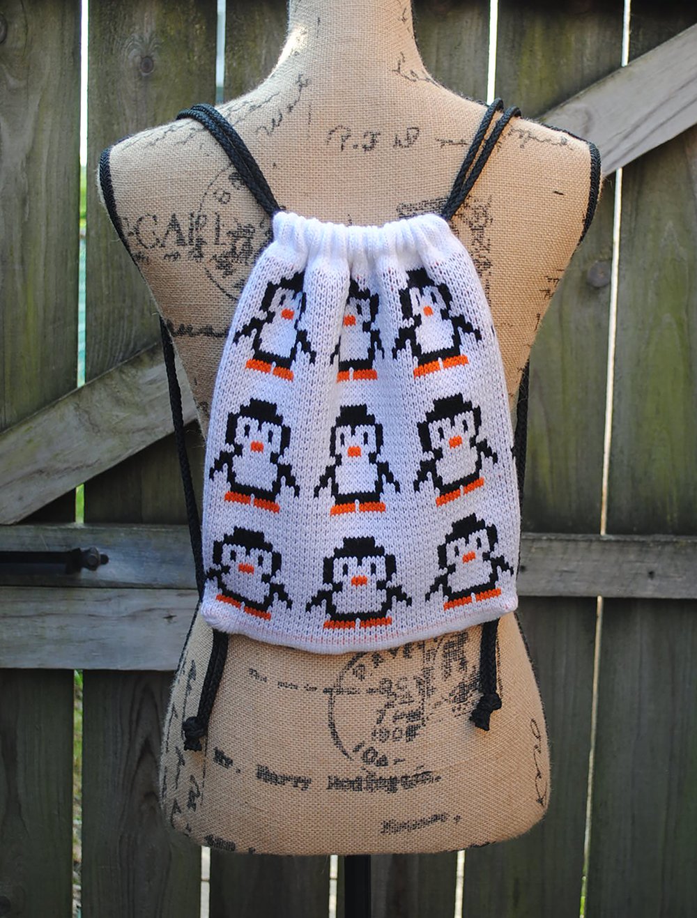 Image of Knitted Drawstring Penguin Backpack