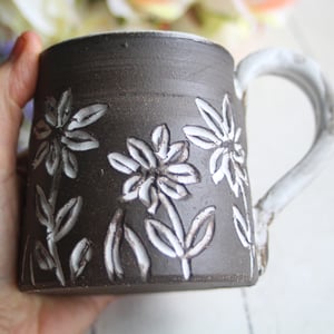 Image of Pottery Mug with Dark Brown Raw Stone Clay, 11 Ounce Coffee Cup with Carved Flowers, Made in USA