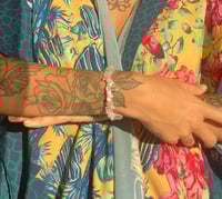 Image 1 of Hidden Rose water pools Bracelet 