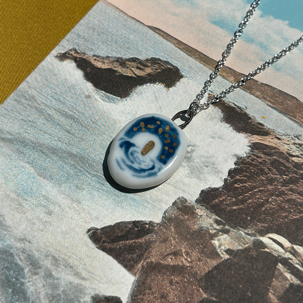 Image of Porcelain Golden Eye Pendant